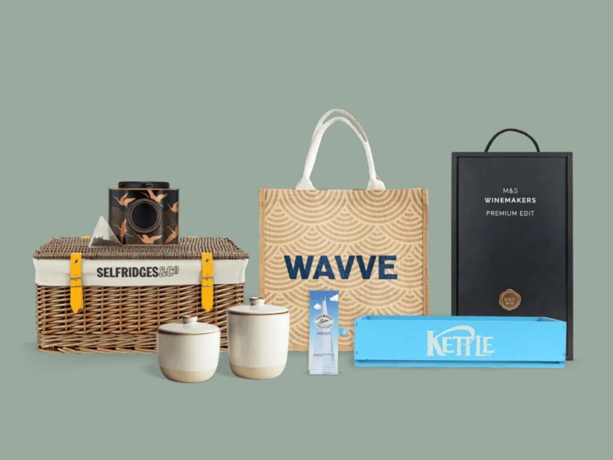 Bespoke products including ceramics, tea tins, wooden bottle boxes and more on a sage green background