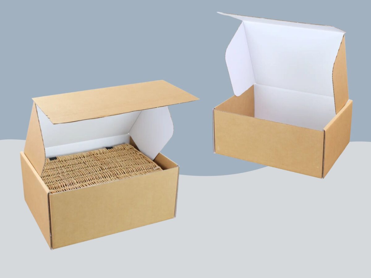 Selection of ecommerce boxes, one shown as empty and the other with a wicker hamper basket in it