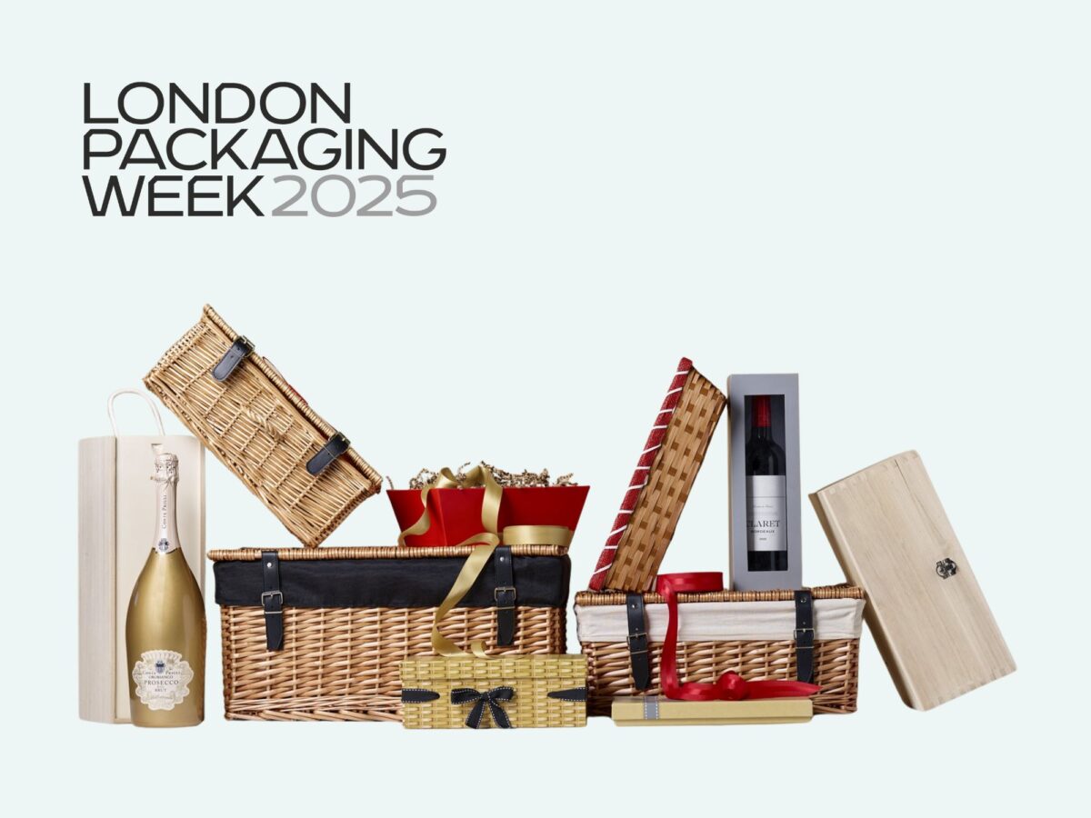Range of different packaging items including cardboard wine boxes, wicker trays and hampers