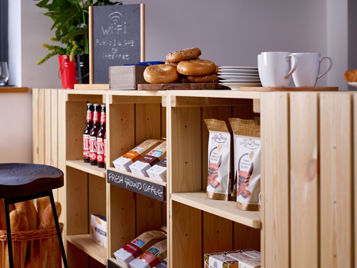 Natural, wooden CrateWall shown in a retail setting