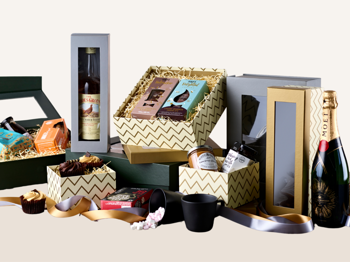 A selection of different gift boxes and hampers including carboard wine boxes