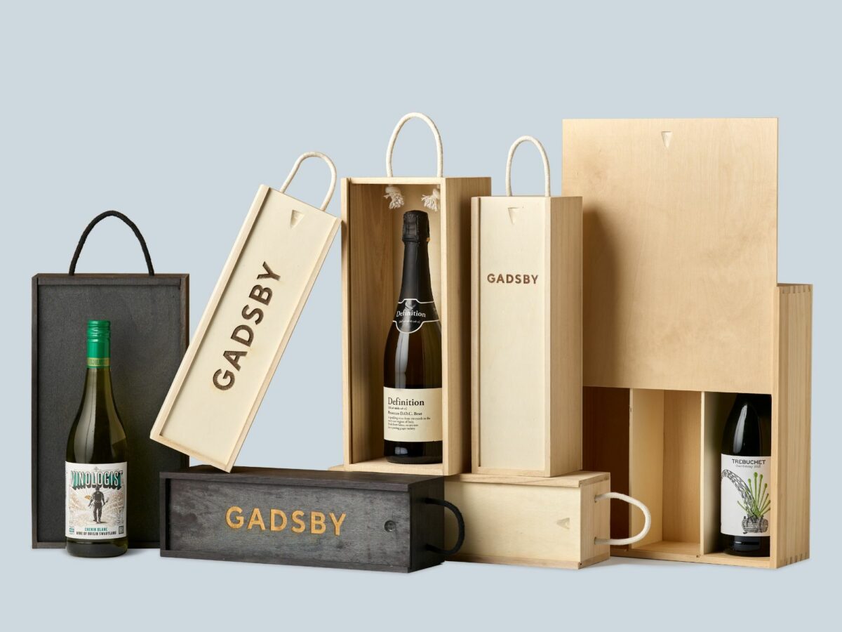 Bottle boxes with a ranging of branding on them using laser engraving