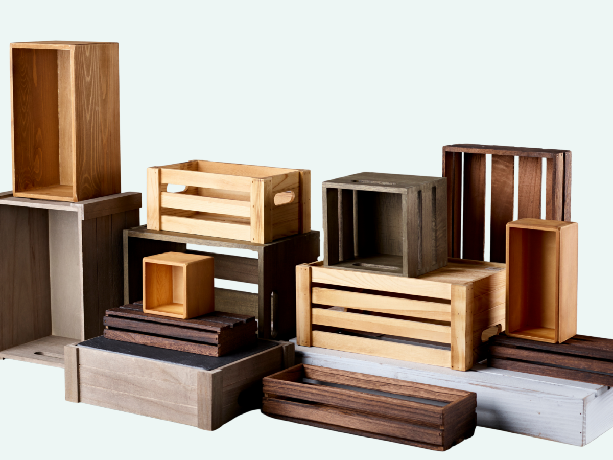 Stack of wooden hamper crates that are perfect for creating bespoke Christmas gift hampers