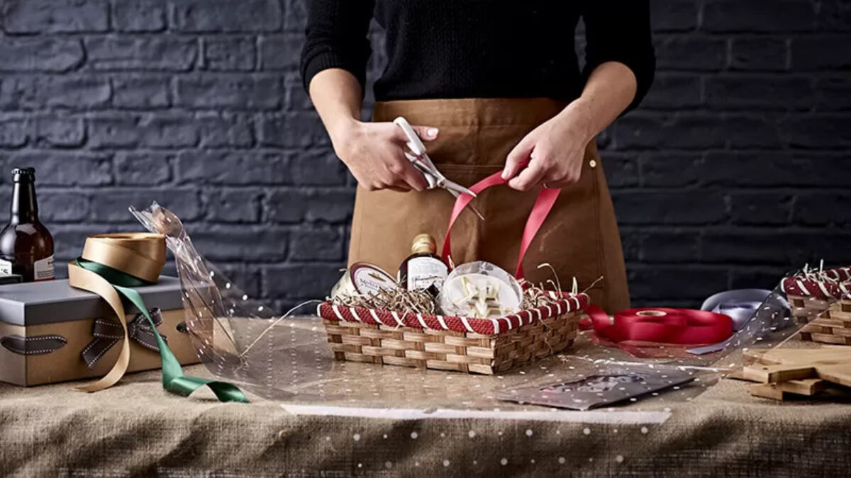 Adding finishing touches to a gift tray